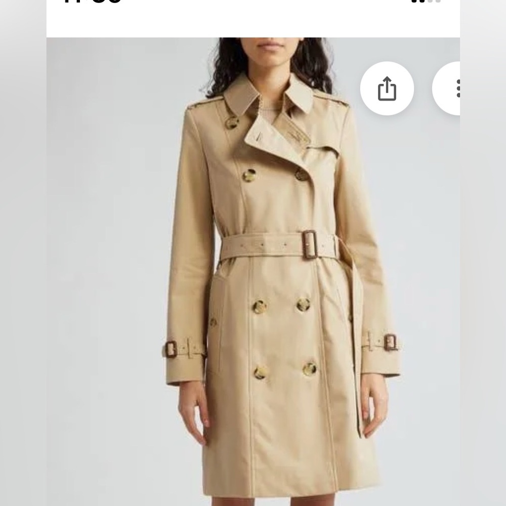 Burberry Trench Coat. XS great condition. like new